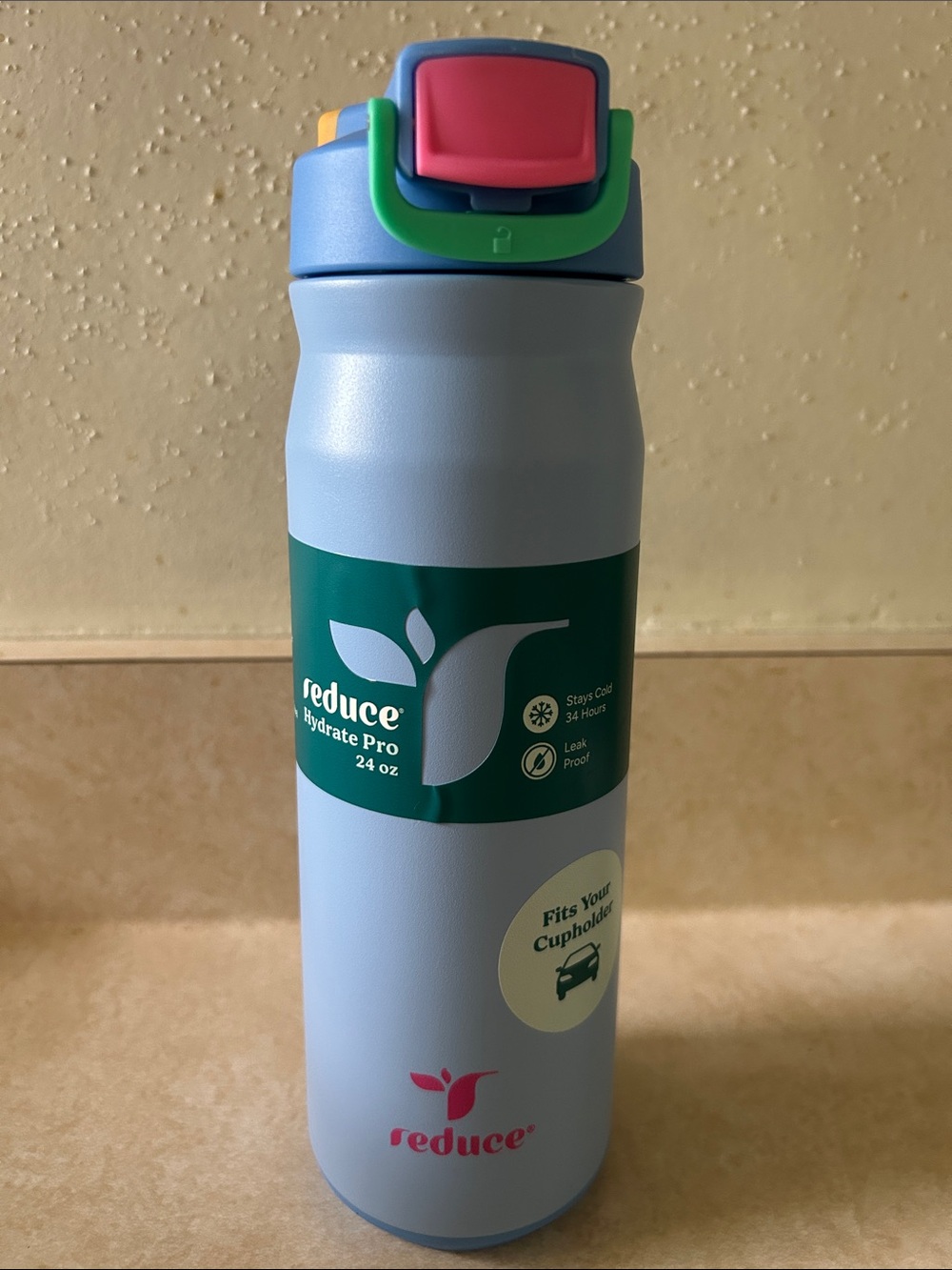 Reduce Hydrate Pro 24 oz Insulated Water Bottle — Light Blue with Colorful Lid